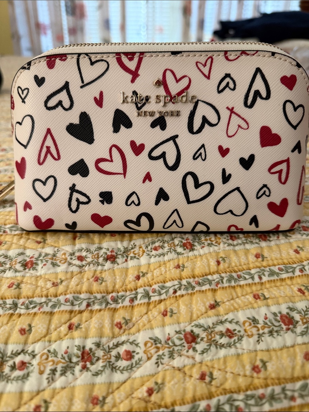 Kate Spade cosmetic case with hearts